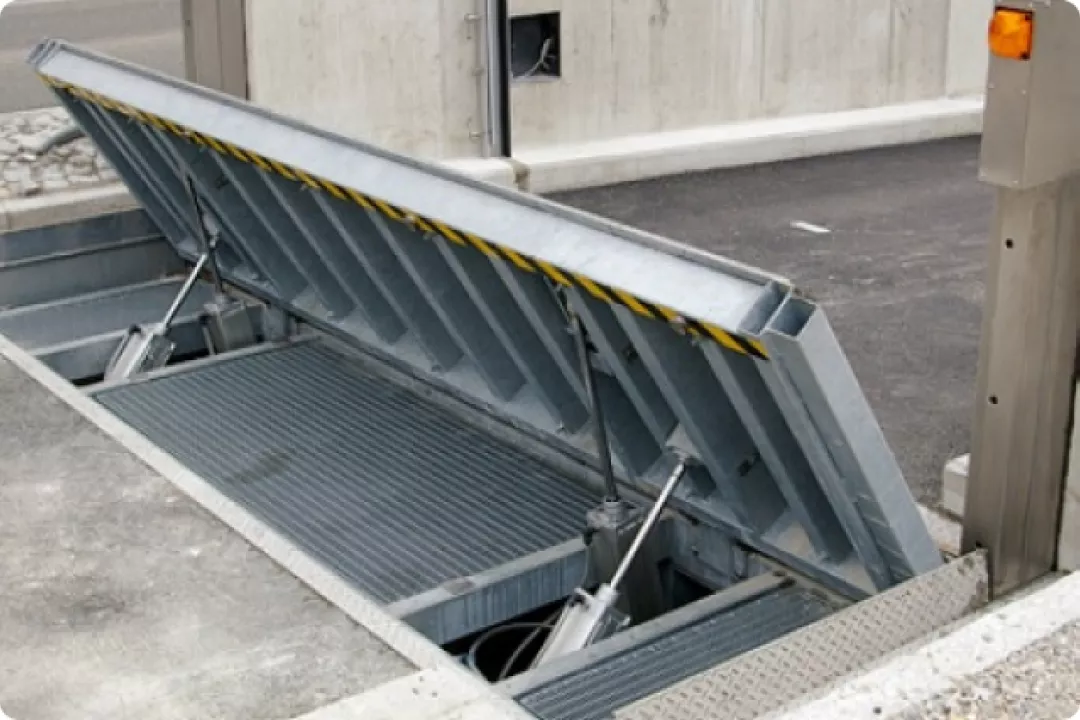 Flip-up flood barrier